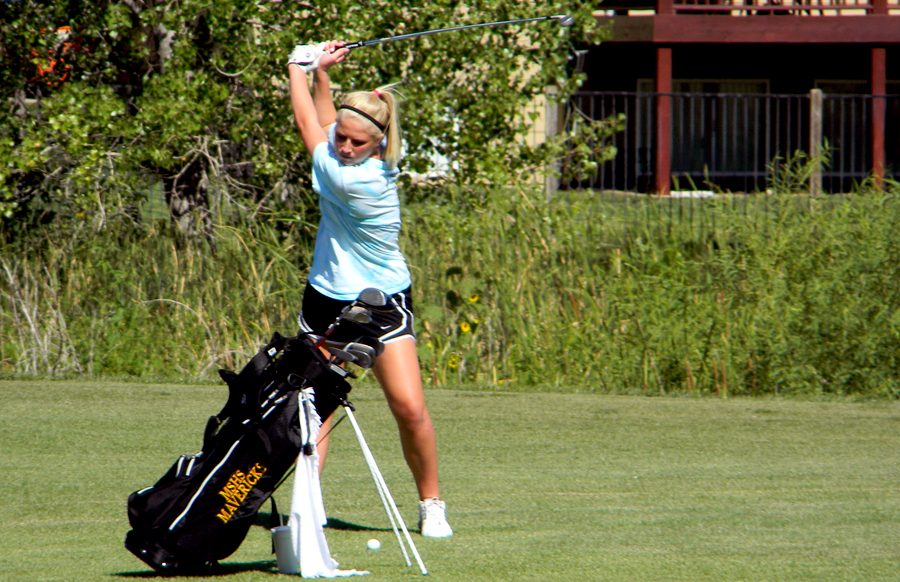 Rachel Schremmer, 9, hits the ball during practice on Sept. 6.  “To get rid of nerves I laugh it off,” Schremmer said.  Photo by J. Hilgers
