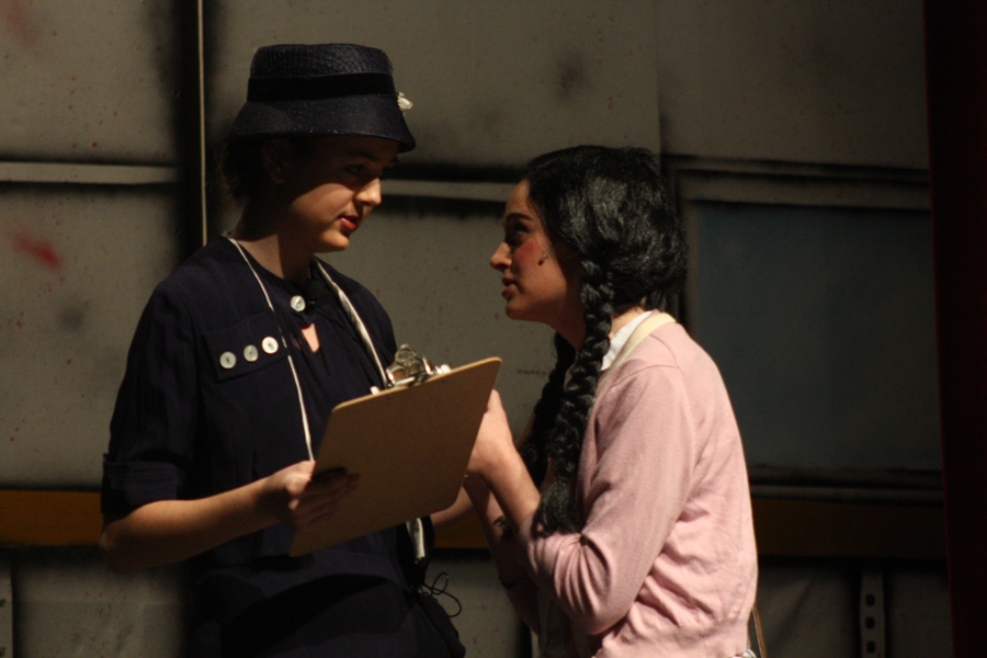 Kara Kolar, 9, and Marisa Page, 10, interact at the play Kindertransport on Nov. 11. Photo by M. Loomis