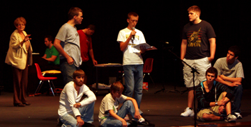 Jacob Braschler, 10, sing his skit while the choir practices for the Oct. performance. Choir will present a holiday show on Dec. 3.  Photo by S. Caron