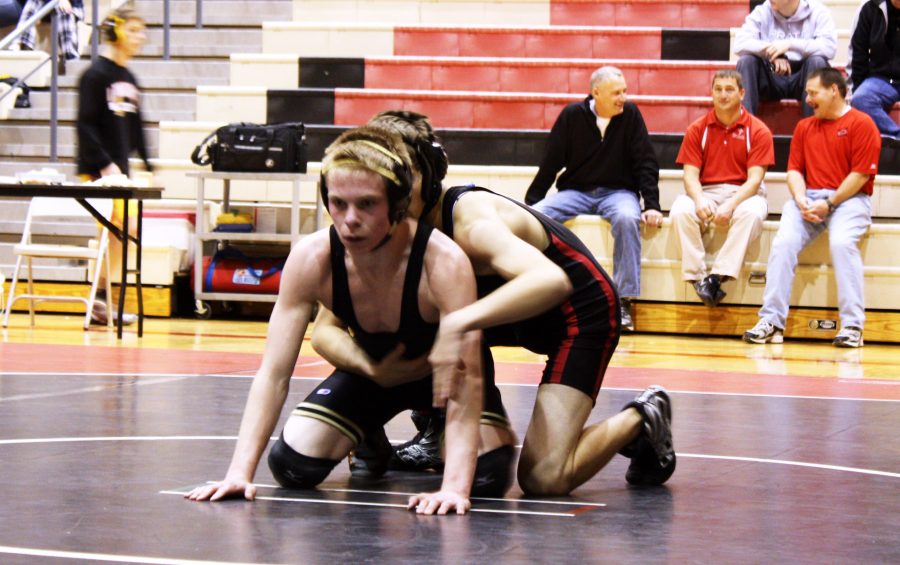 Jesse Bashor, 11, wrestles an opponent on Dec. 7 at the Maize Invitational. South lost at the meet, but maintains a 5-2 record. Photo by A. McLaurian