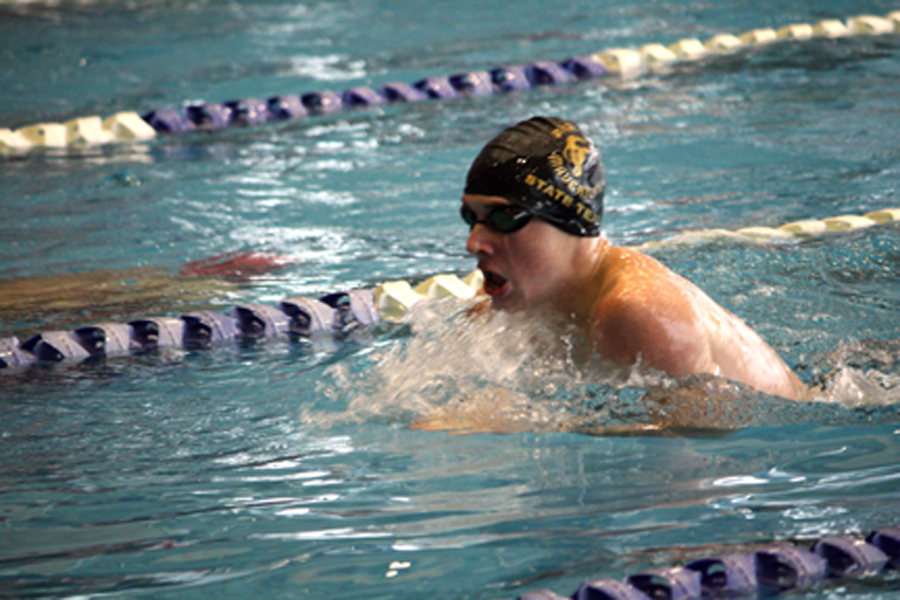 Greyson Heckman, 11, competes at the Northwest YMCA on Dec. 3 at the Maize High Invitational. South took third at the Newton meet on Jan. 5. Photo by T. Mitchell
