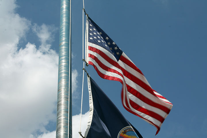The flag hangs at half mast to remember those who died 12 years ago. 