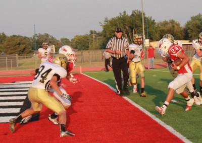 * makes way for a touchdown Friday against Salina South.