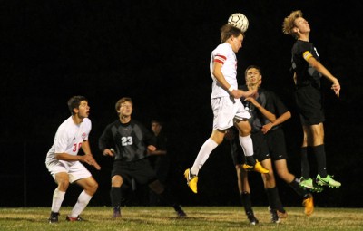 Senior captain* head butts the ball in attempt to score a  goal. Photo by Jet Warren. 