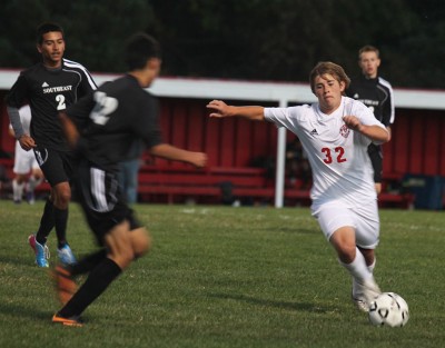 Sophomore Ben Garrison attempts to avoid Southeast on Tuesday. Photo by Brooke Johanson. 
