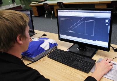 Junior Austin Barr completes his stairway drawing assignment in Drafting II. Photo by Maite Menendez.