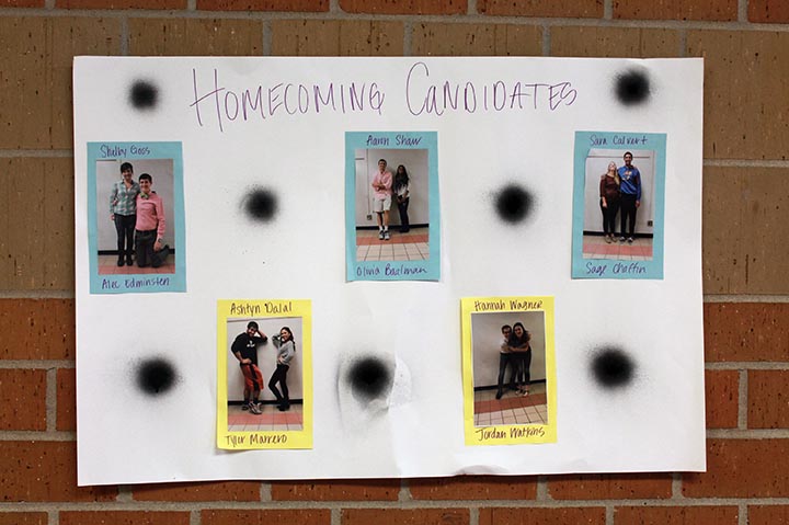 Posters showing the homecoming candidates hang up around the school.