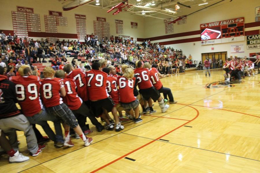 Offence loses to defense during a tug-of-war contest during todays pep rally.