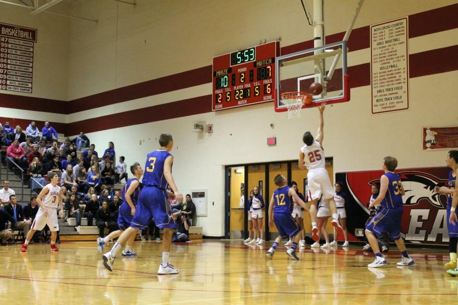 Senior Aaron Shaw shoots a layup during the basketball game against Hutch last Friday night. Photo by Delanie Pierce.