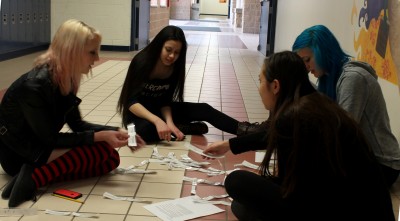 Sophomores in English 10, play a game to remember the uses of commas.  