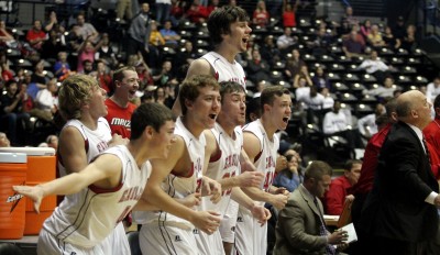 The Maize bench rejoices after a good play in Thursday's state victory at Koch Arena. Photo by Hallie Bontrager