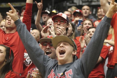 Fans celebrate during Maize's state quarterfinal victory Thursday at Koch Arena.