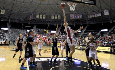 Keiryn Swenson goes up for a basket in Maize's state quarterfinal victory Wednesday. Swenson scored nine points. Photo by Lauren Debes.