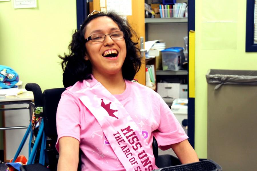 Junior Sandra Jacobs was all smile Monday afternoon as she wore her sash and tiara.