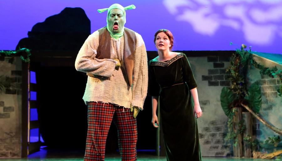 Senior Jessica Curtiss as Fiona and Junior Nick Wynn as Shrek performing in Shrek the Musical for Wichitas Music Theatre for Young People this last weekend.