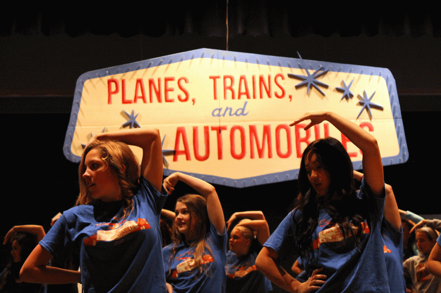 Womens choir gets prepared for their concert, Planes, Trains, and Automobiles. 