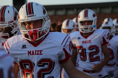 Junior Kyle Schreiber heads out to the field for the game on Sept. 19.