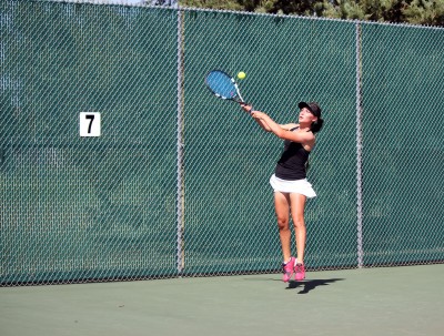 Tiffani Holman hits a backhand at the Maize Tennis tournament. 