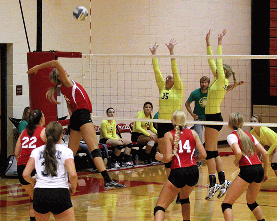 Senior Keiryn Swenson goes up for a spike against Salina South, where they would go on to win the match.