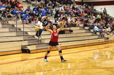 Senior  Maddy Orton serves the ball in the tournament on Saturday