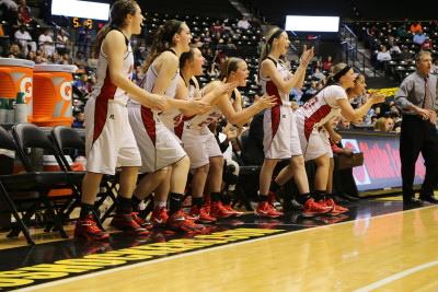 The Lady Eagles bench applauds during the 6A championship game Saturday March 14.