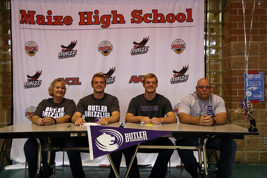 Seniors Keaton and Kendal McGuire sign for different track events at Butler Community College.