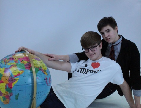 Mercer and Wagner pose with a globe they found. Photo by Madi Devore.
