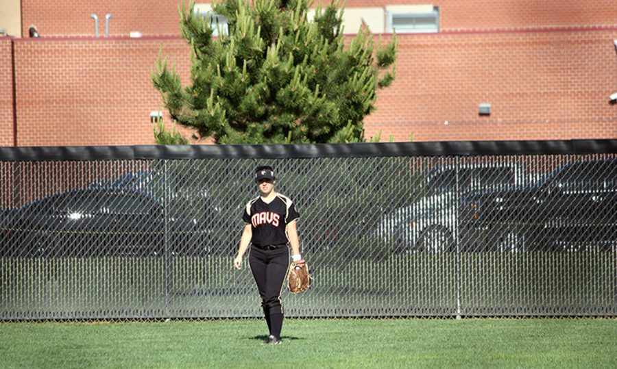 Anissa Brogden, 11, standing in the outfield. “This year my goal is to improve my playing and to become a leader on the field,” Brogden said. 