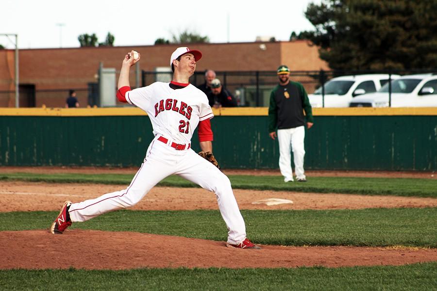 Junior Jake Doerflinger winds up for a pitch. Doerflinger pitched well in game two against Salina South, but the Eagles fell short.