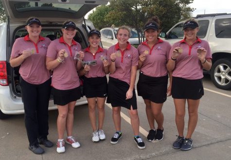 The girl's varsity golf team poses with their metals from the league tournament. Photo submitted by Riley hunter.