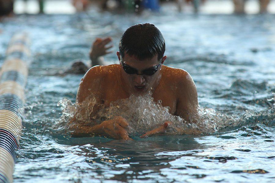 Boys swimming wins league