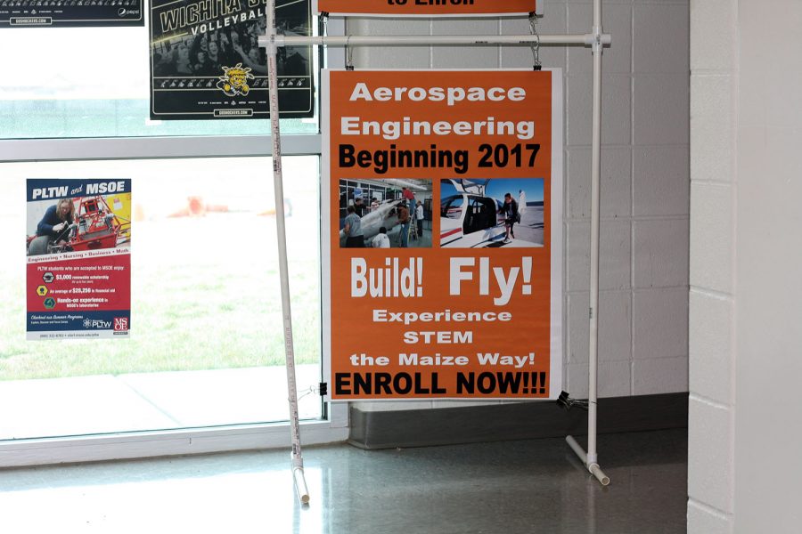 Posters hang along the walls of South to raise awareness of the new Aerospace Engineering class taught by Mikel Tinich, science. Class will begin at the start of next fall. Photo by B. Fletcher