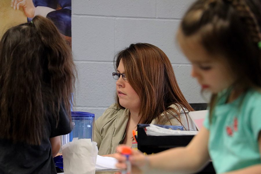 English Teacher Elisabeth Graber spends her free period before school starts with her daughters.
