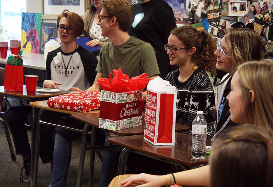 Students in french club gather for their party. They participated in gift exchanges, Christmas themed games, as well as a bunch of delightful treats. Photo by E. Reyes