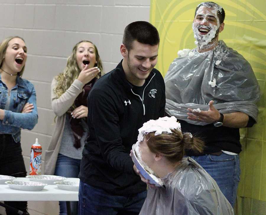 Saxton Bruner, 12, pies Lyndsey Brown, consular. Students got the opportunity to pie their teachers.