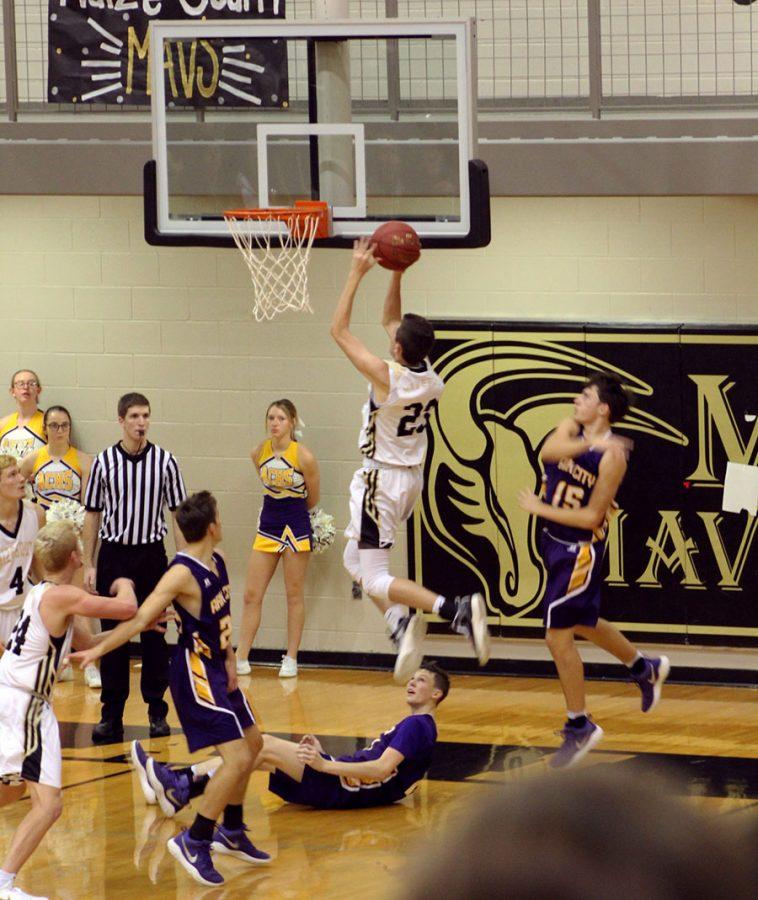 Hayden Bontrager, 11, goes for a lay up. Mavs beat Arc City on Dec. 8. Photo by C. Willig