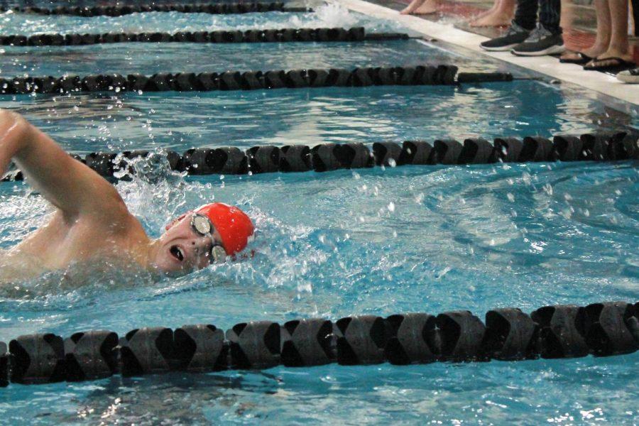 Senior Trysten Prophet comes up for air while competing in the 500 yard freestyle. 