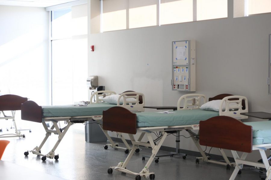 In the new CTE building there is a room for the CNA classes. The room includes hospital beds, a 130 pound dummy and a wheelchair accessible shower all for practice.