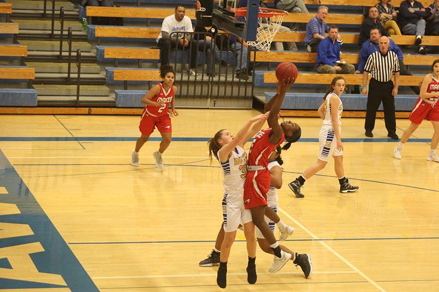 Autumn Hanna goes up for a shot Tuesday against Hutchinson. The Eagles won 57-34.
