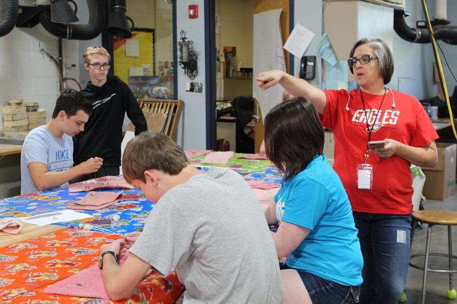 Students in Beth Janssens art class are working on quilt inspired artist Marie Watt. The final product eventually will be on display at Crystal Bridges Museum in Arkansas.
