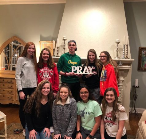 Logan Forrest with friends at bible study.