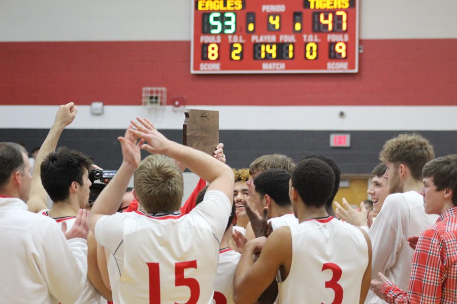 The Eagles celebrate after defeating Eisenhower 53-47 Saturday. The Eagles are 22-0 and ranked No. 1 in the state. 