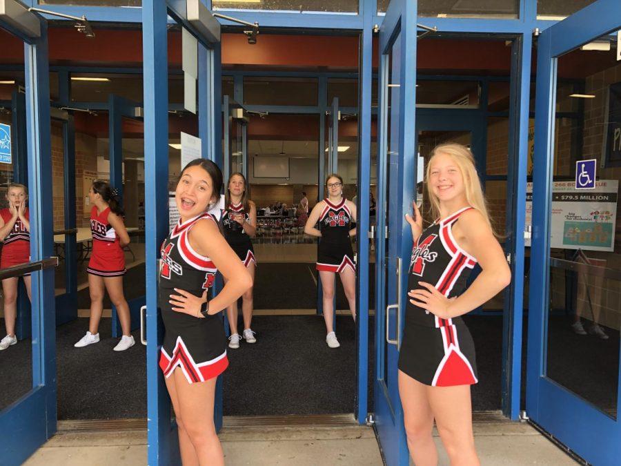 Maize cheerleaders prepare for the new season by selling Eagle gear. The event occurred on Monday, Aug. 19.
