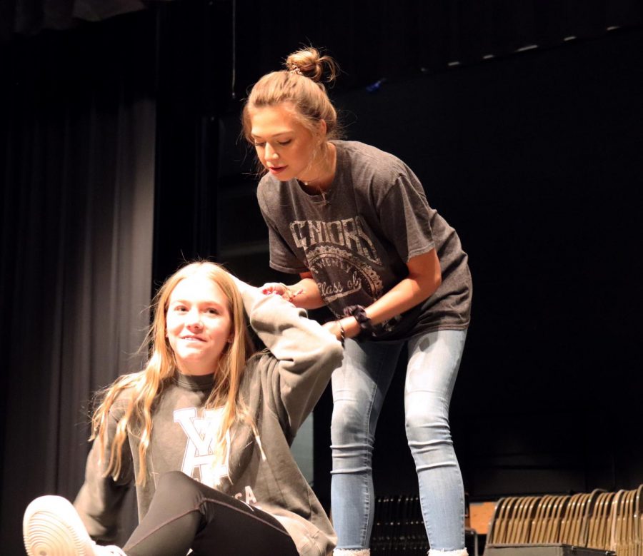 In the middle of a scene, Freshmen Lillian Cassidy & Ashtyn Scaeffer play around in a kindergarten scene. Attempting to braid the girls hair, Cassidy begins to pull at it.