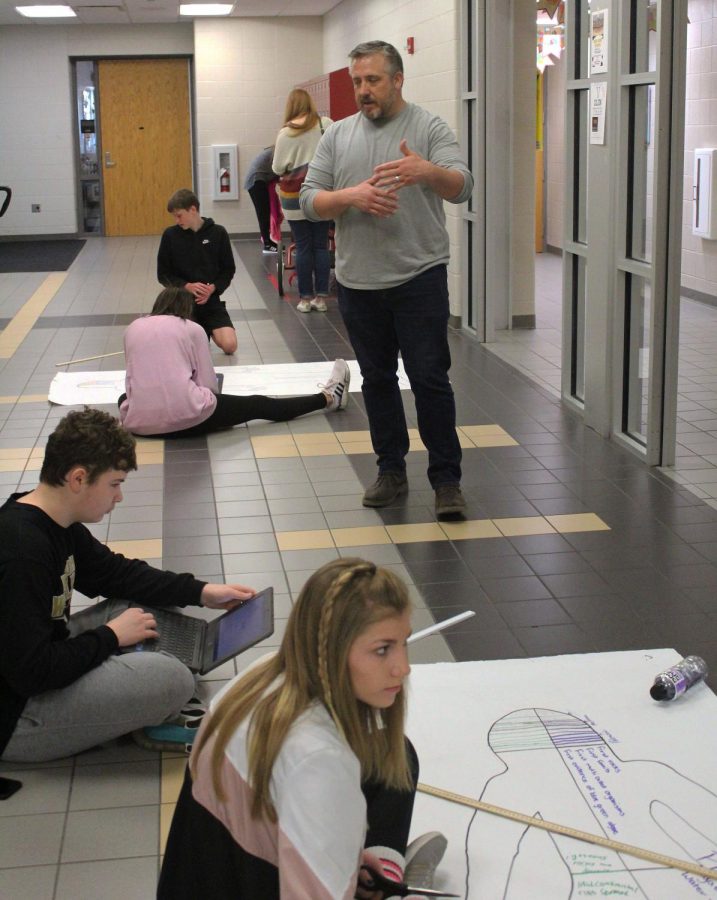 A freshman science class wraps up this quarter with a project about the human body. The students were labeling characteristics of each specimen based on the location of where they were found and the unique traits that bodies found in Kansas develop due to bodies of water.