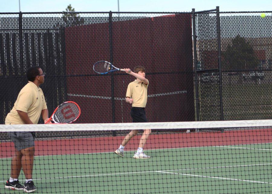 During the last week of Term 3, Justin Maina and Hunter McAcey vigorously battle against Maize High in the doubles portion of the boys tennis scrimmage on Thursday, March 12 at the Maize South tennis complex.
