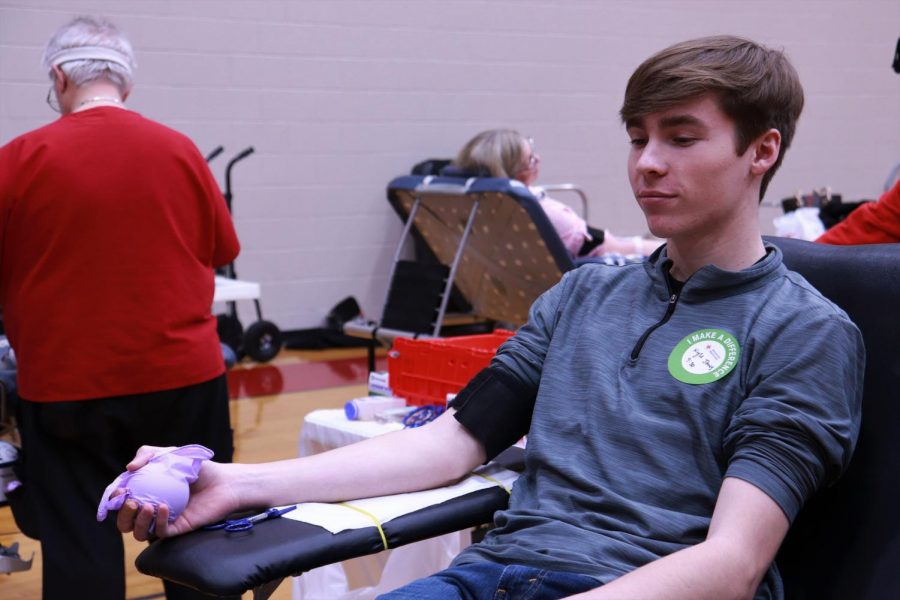 Senior Kyle Jones anxiously waits as the nurse prepares to take his blood at the Maize South blood drive on Friday, February 28.