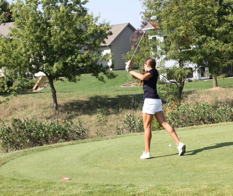 Teeing off, Jaden Kordonowy (11) makes her first move at the Auburn Hills invitational on the front nine hole 6 on Thursday, Sept. 24. 