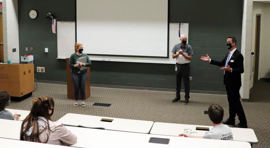 Visiting the lecture hall at Maize South in September 2020, Dr. Chad Higgins honors Drama teacher Micaela Heinrich for her nominee as a Kansas Horizons Award finalist in USD 266 at the secondary level.