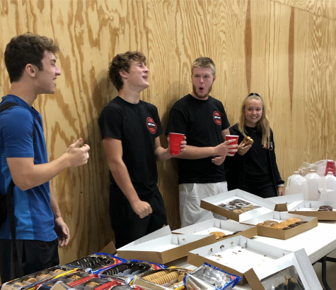 The MS Leche club conducts a monthly meeting last year where they would hang out during EnCor while eating milk and cookies as a way to take the stress of school off of their shoulders. Cooper Schoonover (Second from left to right), graduate, is seen enjoying a cup of milk and having a laugh with Josh Goodale (Far left), Connor Shannon (Second to the right), and Logan Patterson (Far right), all of which are graduates of Maize South High School.
